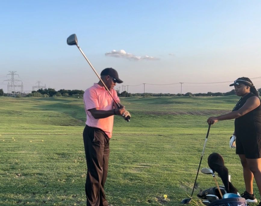 Golf lesson at driving range